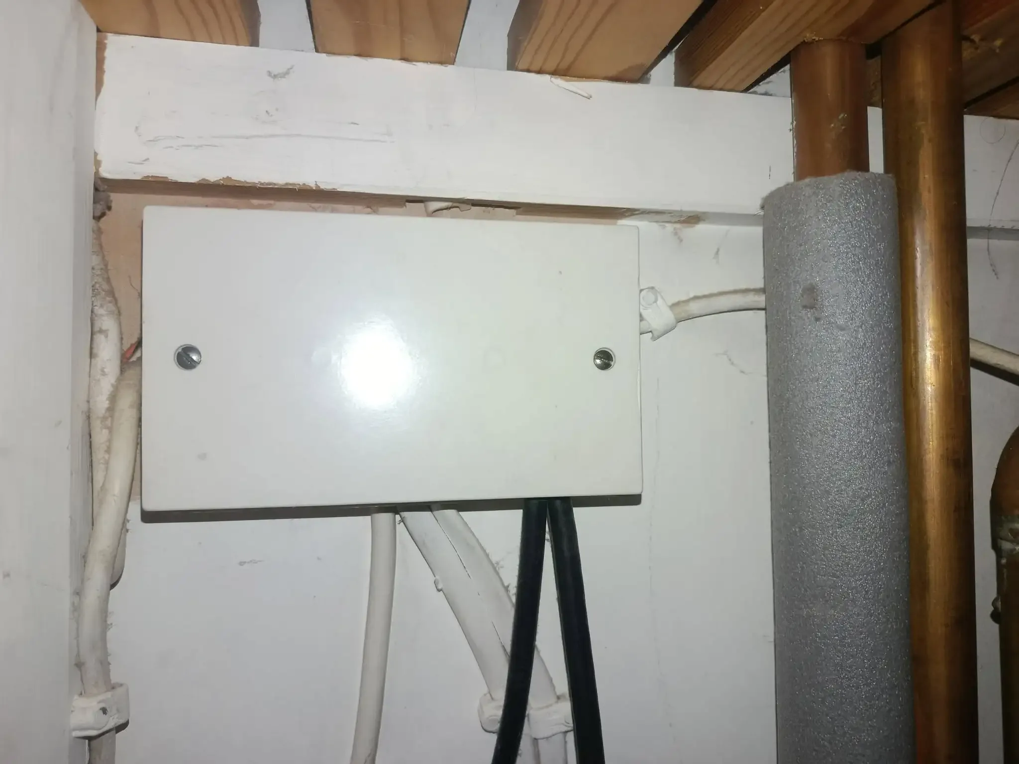 Water heater thermostat control unit inspected by technician in Killeen TX
